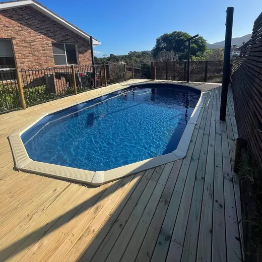 New timber deck around an above-ground pool
