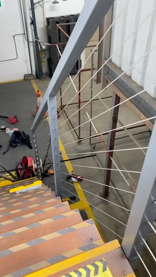 Steel stair balustrade with wire infill