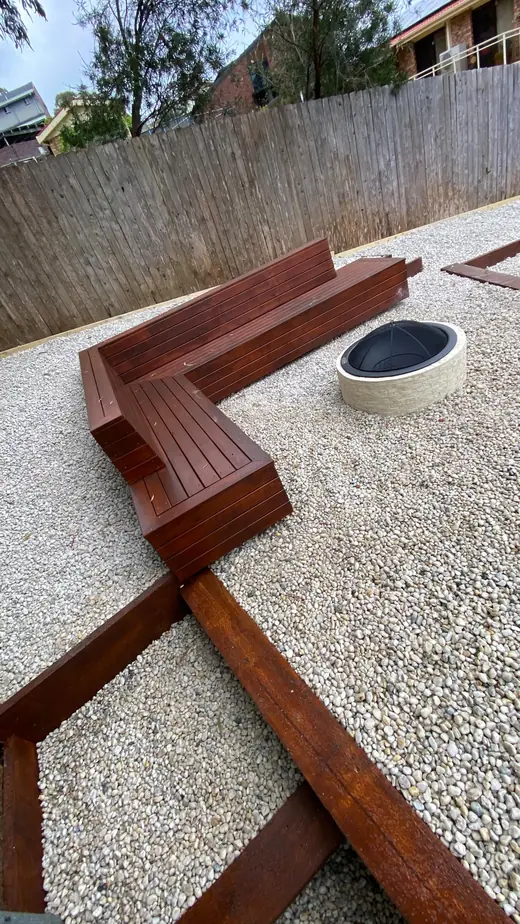 Timber bench seating around a fire pit