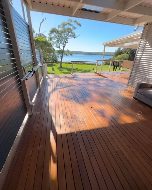 Stained timber deck with lake views