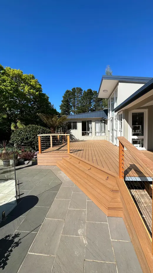 Timber deck walkway beside a home