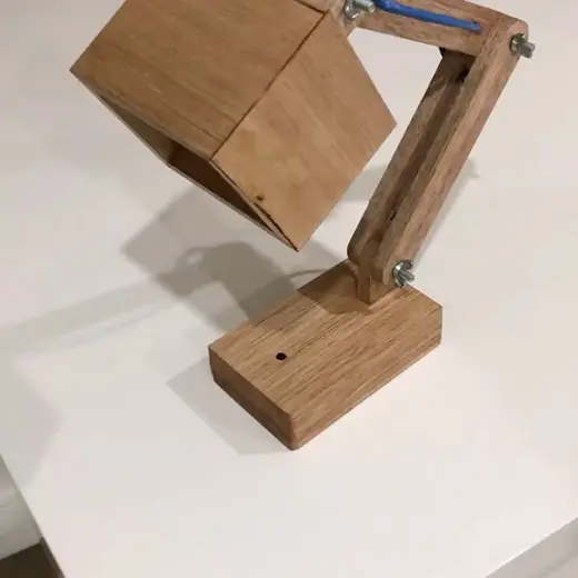 Timber desk lamp with an angled arm