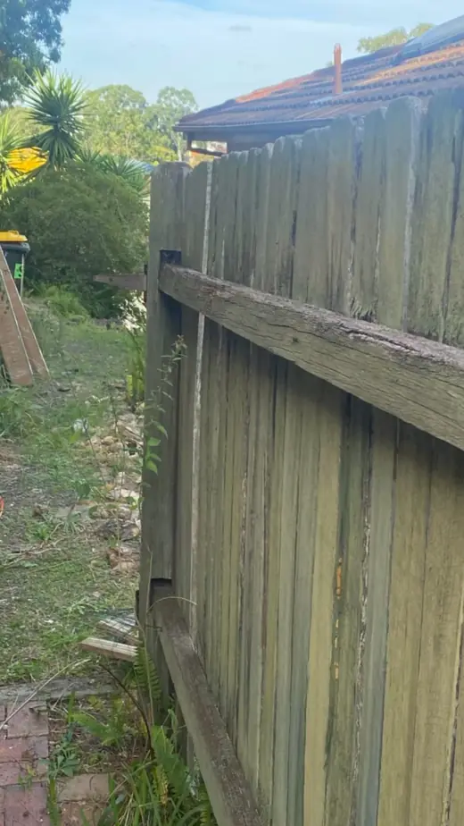 Timber fence on a sloping yard