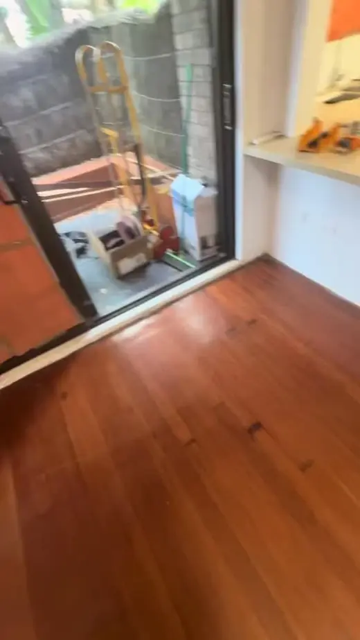 Polished timber flooring in a renovated room