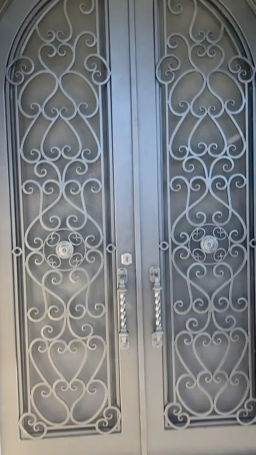 Ornate wrought-iron double gates